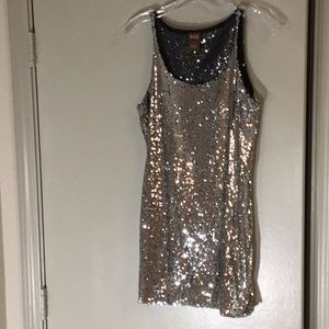 Designer Lady’s top; size Large.All silver sequins